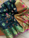 Black colored Soft banarasi silk saree with woven design