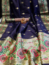 Navy blue color soft banarasi silk saree with zari woven border