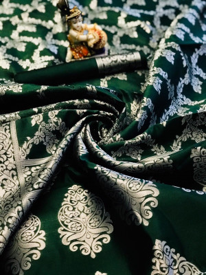 Green colored Banarasi silk saree with jacquard weaving work