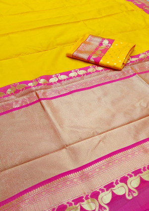 Yellow color soft banarasi silk saree with zari work