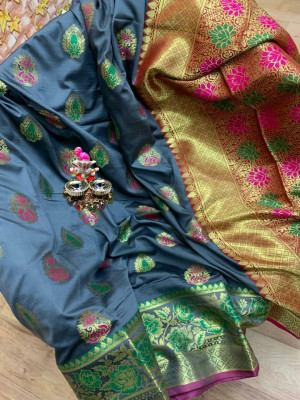 Grey colored Soft banarasi silk saree with woven design