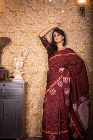 Maroon color soft raw silk saree with zari work