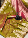 Mehndi green color ikkat silk saree with weaving work