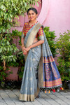 Gray color tussar silk saree with zari weaving work