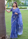Blue color pure linen silk saree with zari weaving work