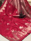 Pink color ikkat silk saree with weaving work
