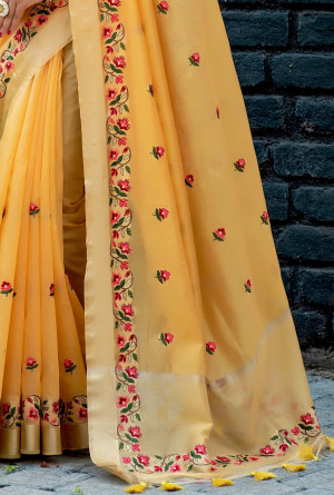 Yellow color linen cotton saree with embroidery work
