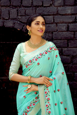 Sea green color linen cotton saree with embroidery work