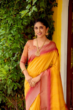 Mustard yellow color south silk saree with zari woven contrast border