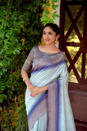 Gray color south silk saree with zari woven contrast border