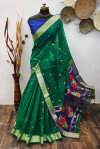 Green color raw silk saree with zari woven work