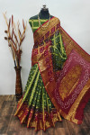 Mahendi green and maroon color hand bandhej silk saree with zari weaving work