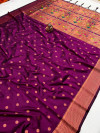 Magenta color paithani silk saree with copper zari weaving work