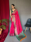 Rani pink  color patola silk saree with weaving work