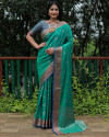 Green color banarasi silk saree with golden zari weaving work