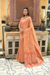 Peach color linen silk saree with zari weaving work