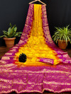 Yellow and pink color art silk saree with zari weaving work