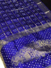 Royal blue color pure hand bandhej silk saree with zari weaving work