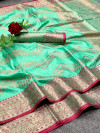 Sea green color linen silk saree with golden zari weaving work