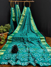 Rama green color soft bandhani silk saree with khadi printed work