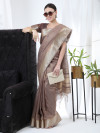 Brown color linen silk saree with zari weaving work