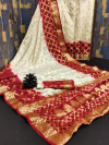 Off white and maroon color soft art silk saree with zari weaving work