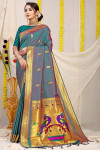 Rama green color paithani silk saree with golden zari weaving work