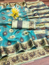 Sea green color soft organza silk saree with  zari weaving work
