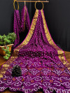 Magenta color soft bandhani silk saree with khadi printed work