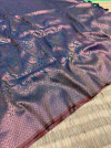 Bottle green color kanchipuram silk saree with zari woven work