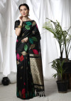 Black color tussar silk saree with zari woven work