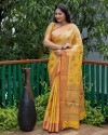 Yellow color linen silk saree with golden zari weaving work