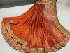 Orange color georgette saree with bandhej printed work