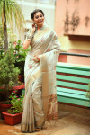 Light green color linen silk saree with printed work