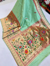 Sea green color paithani silk saree with golden zari weaving work