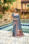 Gray color linen silk saree with zari woven work