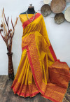 Yellow color raw silk saree with woven work