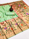 Sea green color paithani silk saree with golden zari weaving work