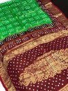 Parrot green and maroon color pure hand bandhej silk saree with zari weaving work