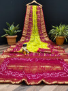 Lemon yellow and red color pure hand bandhej silk saree with zari weaving work