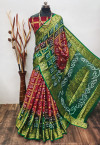 Maroon and  green color hand bandhej silk saree with zari weaving work