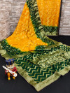 Yellow and green color art silk saree with zari weaving work