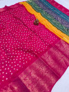 Rani pink color cotton silk saree with bandhej printed work