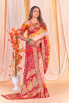 Beige color bandhej silk saree with zari weaving work