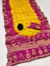 Yellow and pink color hand bandhej silk saree with zari weaving work