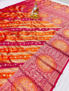 Orange and rani pink color kanchipuram silk saree with zari weaving work