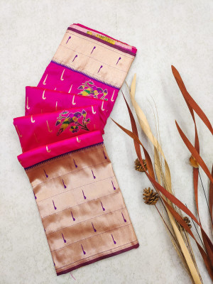 Rani pink color soft paithani silk saree with zari weaving work