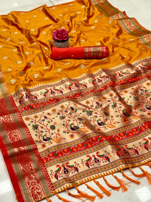 Mustard yellow color paithani silk saree with gold zari weaving work