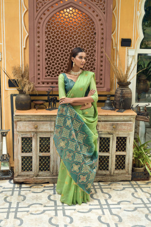 Green color linen silk saree with zari weaving work