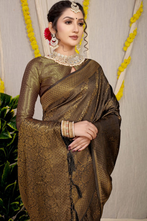 Black color soft fancy silk saree with golden zari weaving work